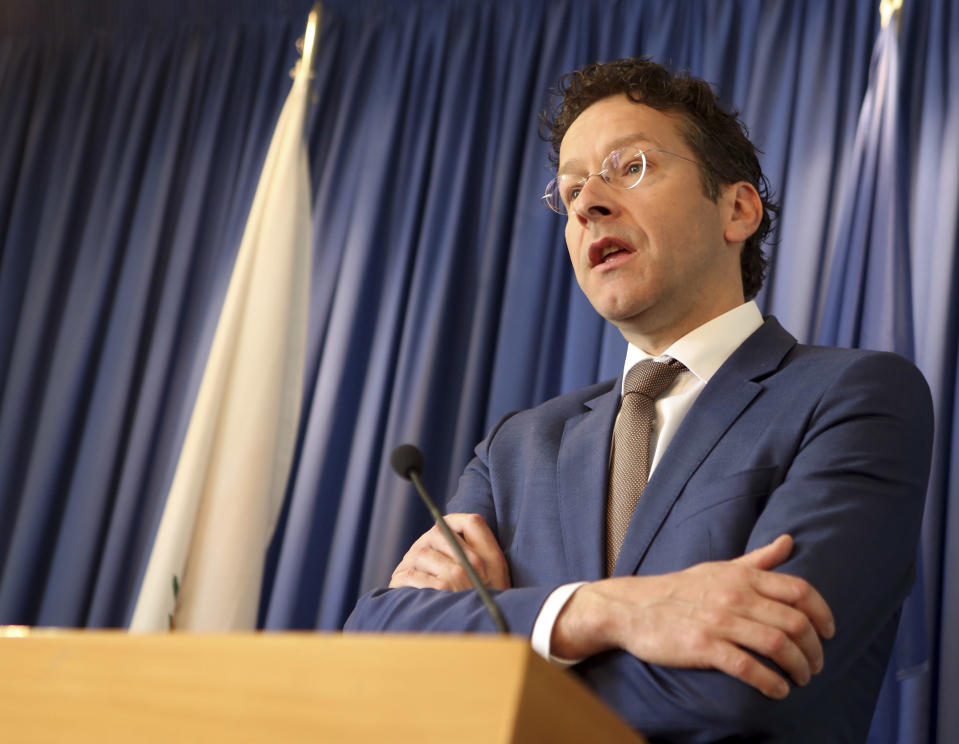 Eurogroup President Jeroen Dijsselbloem speaks to the media, during a press conference, after his meeting with Cyprus' finance minister Harris Georgiades at the Ministry of Finance in Nicosia, Cyprus, Monday, March 31, 2014. Cyprus has received a 10 billion Euro bailout from the European Commission, the European Central Bank and the IMF, known as the Troika and has been subjected to three evaluations so far from its international lenders. (AP Photo/Philippos Christou)