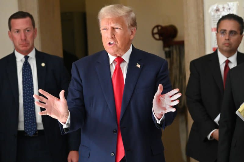 Former President Donald Trump arrives for day two of his civil fraud trial at State Supreme Court on Tuesday in New York City, where the judge issued a limited gag order after the ex-president blasted his law clerk in a social media post. Photo by Louis Lanzano/UPI