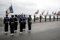 Navy soldiers awaiting French President Emmanuel Macron for a ceremony prior to his New Year's speech to the French Armed Forces at Brest naval training center, western France, Tuesday, Jan. 19, 2021. (Stephane Mahe/Pool Photo via AP)