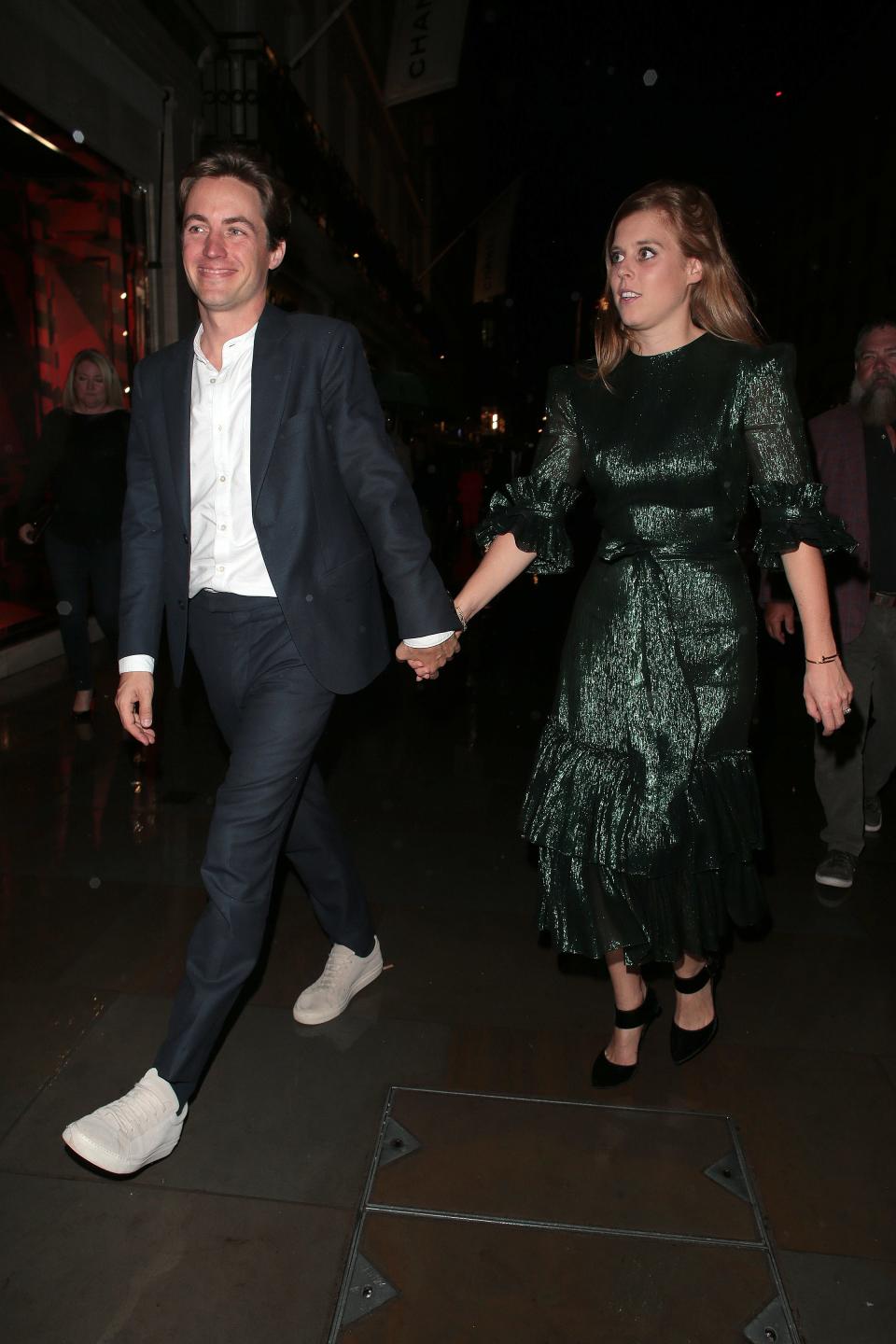 Princess Beatrice wearing a green sparkly dress