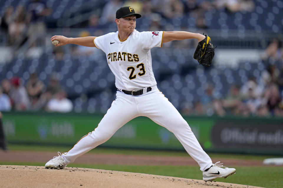 Pittsburgh Pirates starting pitcher Mitch Keller delivers during the first inning of the team's baseball game against the Cincinnati Reds in Pittsburgh, Friday, April 21, 2023. (AP Photo/Gene J. Puskar)