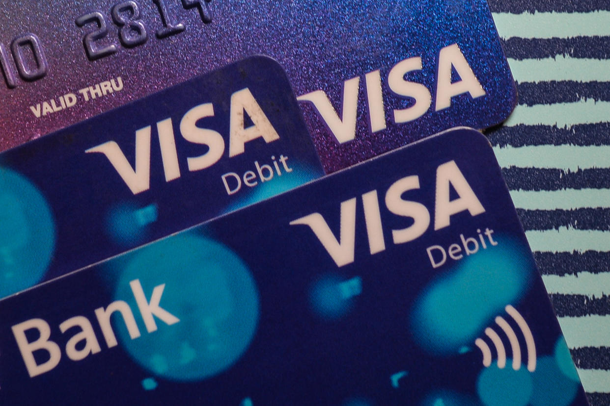 An illustrative image of Visa and Visa debit cards.
On Sunday, January 3, 2021, in Dublin, Ireland. (Photo by Artur Widak/NurPhoto via Getty Images)