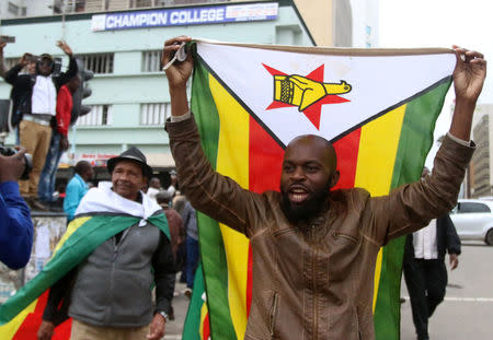 Protesters gather calling for Zimbabwean President Robert Mugabe to step down, in Harare, Zimbabwe November 18, 2017. REUTERS/Philimon Bulawayo