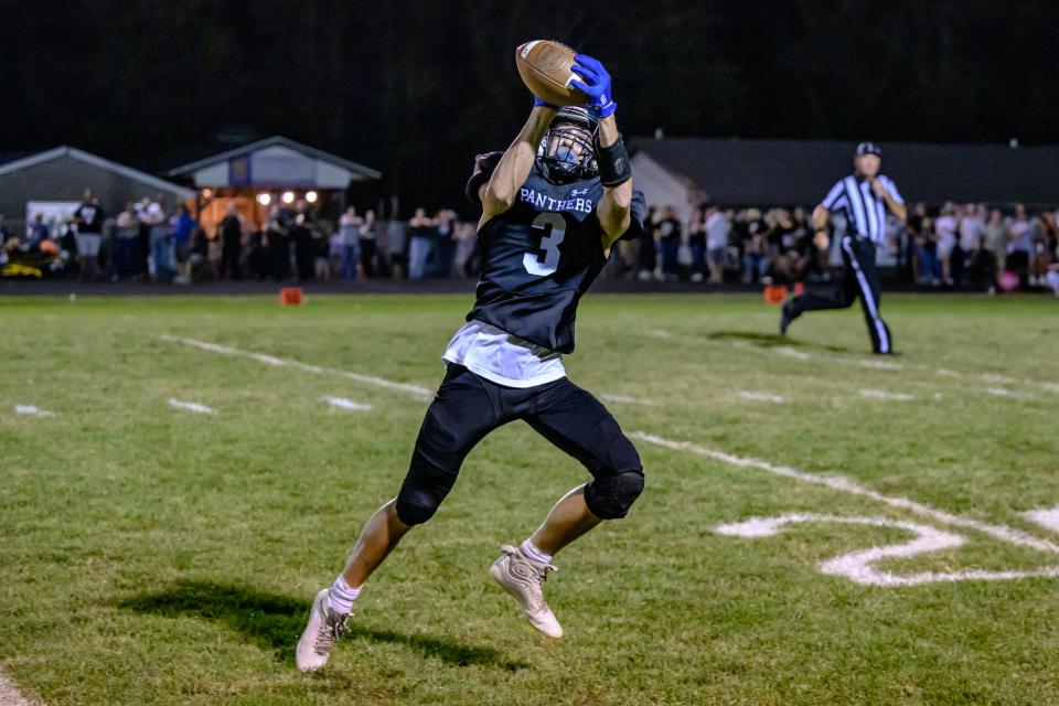 Centralia's Beau Hatton (3) grabs the pass before scoring a Panther touchdown during a game at Centralia High School on Sept. 29, 2023, in Centralia, Mo.