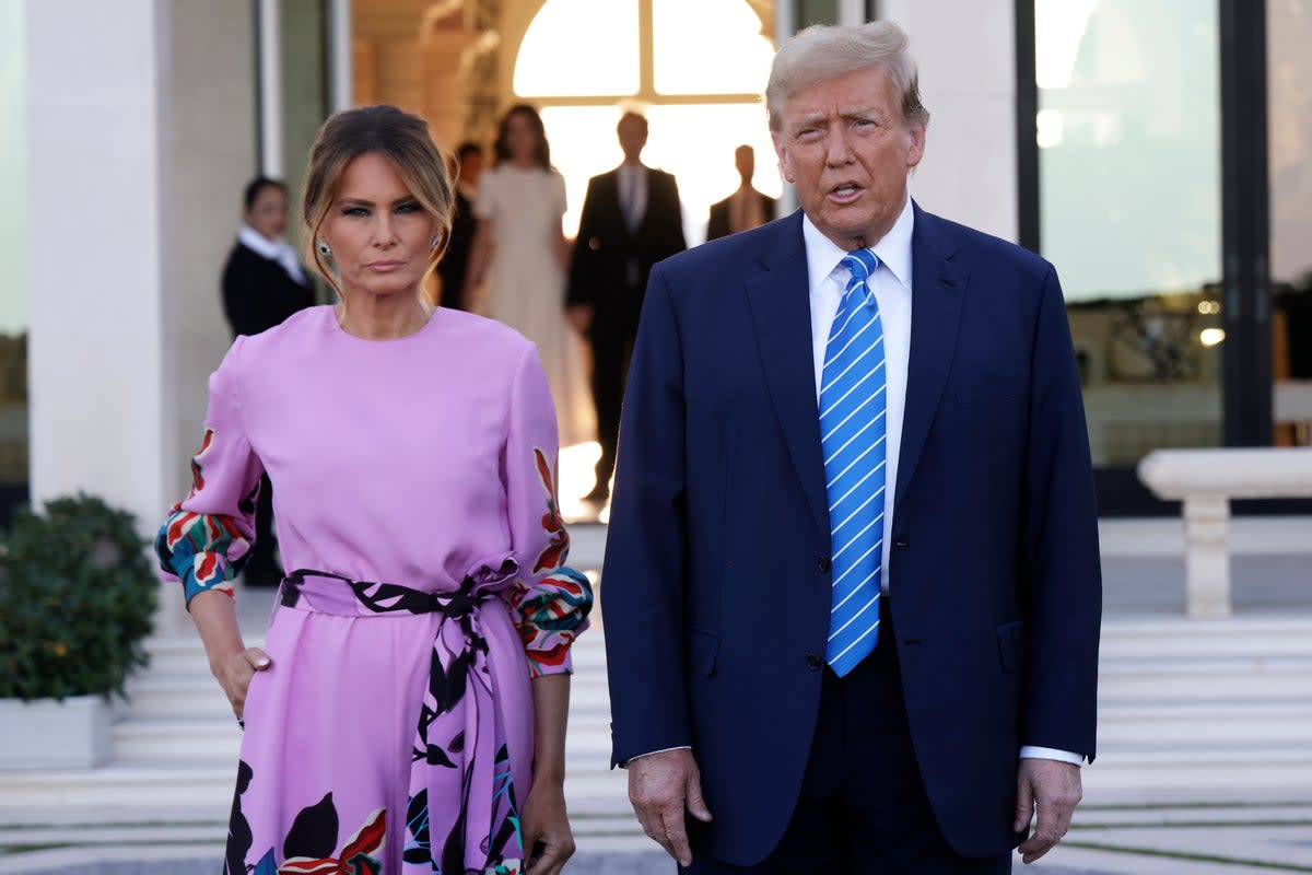 Republican presidential candidate, former US President Donald Trump, arrives at the home of billionaire investor John Paulson, with former first lady Melania Trump, on April 6, 2024 in Palm Beach, Florida (Getty Images)