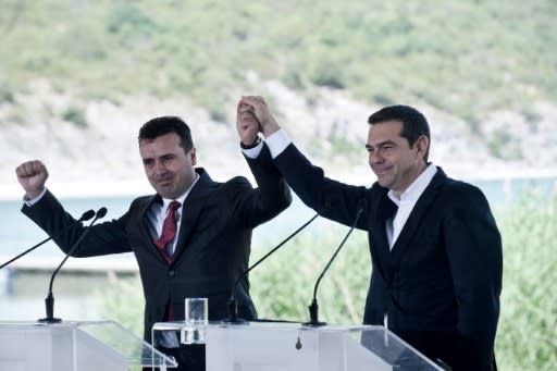 The name change was agreed on in talks between Greek Prime Minister Alexis Tsipras, seen on the right, and his Macedonian counterpart Zoran Zaev, both of whom were at the signing ceremony