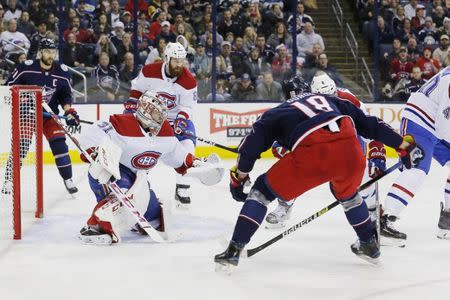 Jan 18, 2019; Columbus, OH, USA; Montreal Canadiens goalie Carey Price (31) makes a save from the shot of Columbus Blue Jackets left wing Pierre-Luc Dubois (18) during the second period at Nationwide Arena. Mandatory Credit: Russell LaBounty-USA TODAY Sports