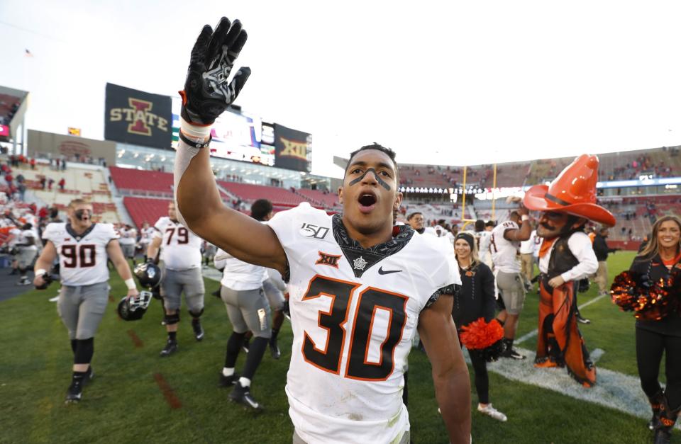 Oklahoma State running back Chuba Hubbard celebrates after a win.