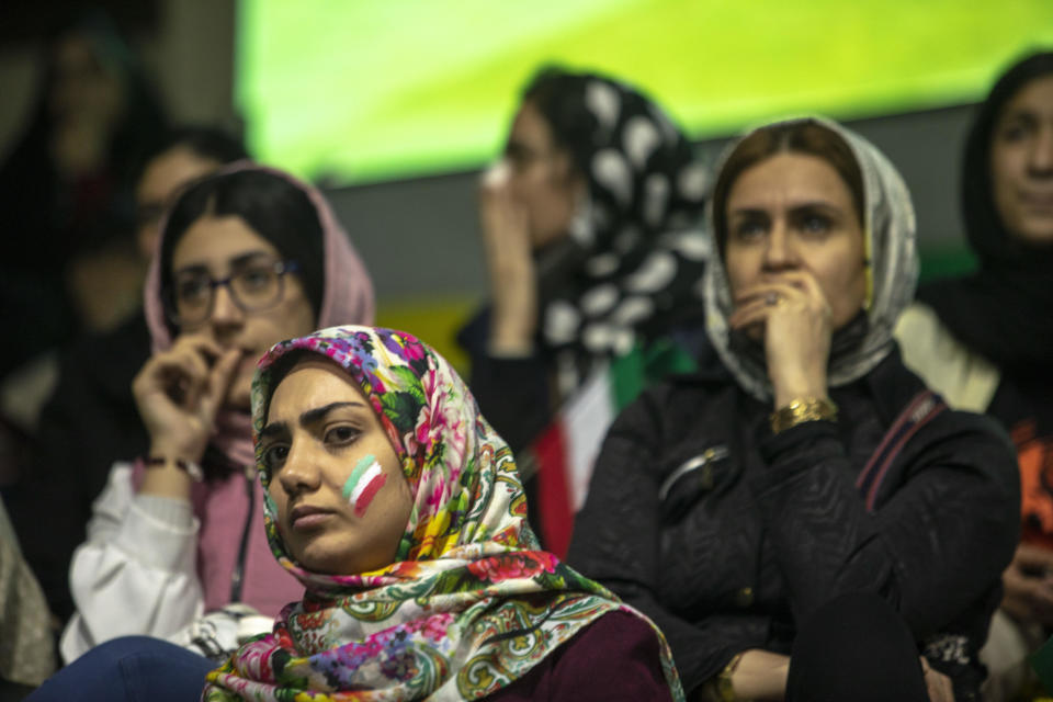 Iranian football fans watch the Qatar 2022 World Cup Group B football match against the United States in a government center on November 29, 2022 in Tehran, Iran. / Credit: Getty Images