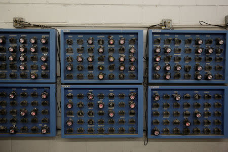 Miner's lamps are recharged at the Century Mine in Beallsville, Ohio, U.S., November 7, 2017. REUTERS/Joshua Roberts