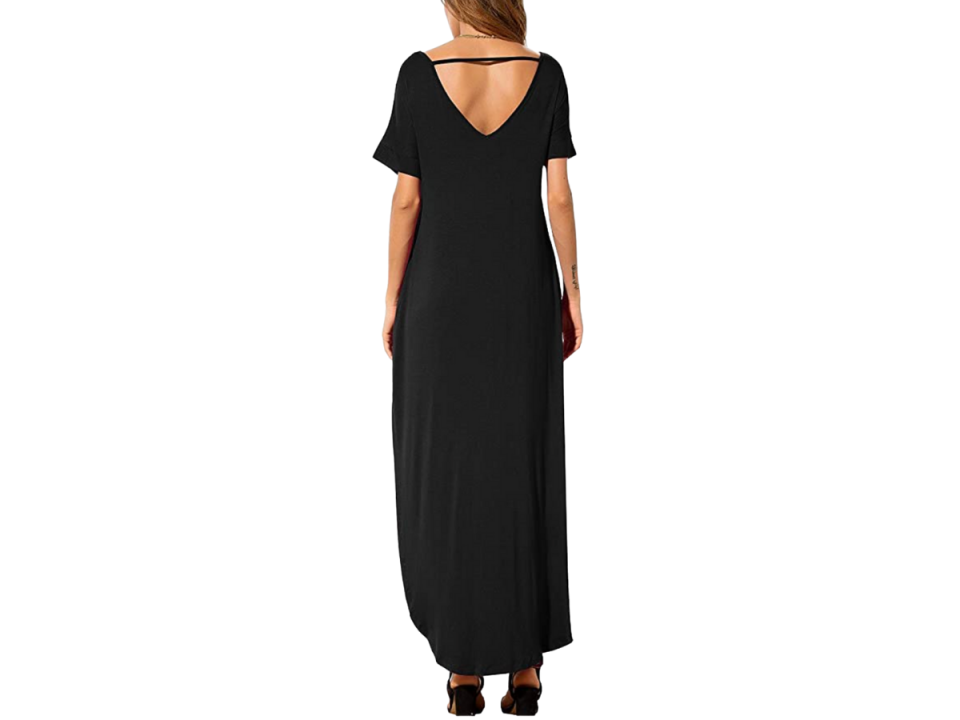 A back view of a model in a black maxi dress from Grecerelle.