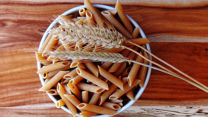 Whole wheat pasta in bowl 