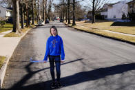 Rebekah Bruesehoff, 14, poses for a portrait in New Jersey, Friday, Feb. 26, 2021. The transgender teenager competes on her middle school field hockey team and hopes to keep playing in high school. "It’s all been positive,” she said. “The coaches have been really helpful.” (AP Photo/Matt Rourke)