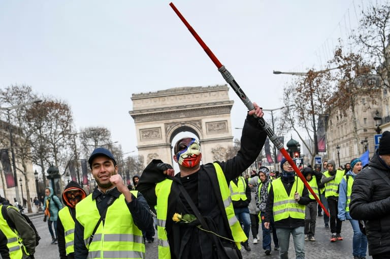 So-called "yellow vest" protesters gathered on the Champs Elysees in Paris on Saturday