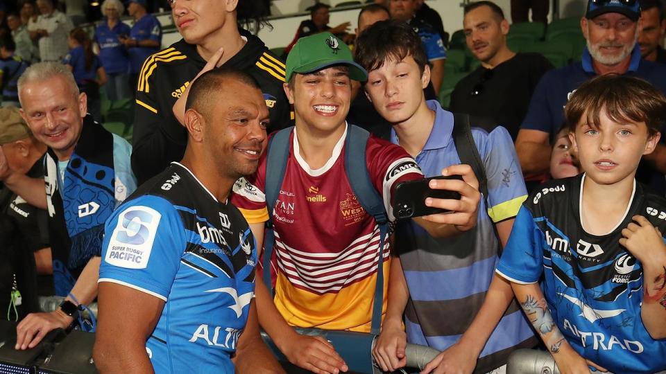 Kurtley Beale mingling with young fans after a match.