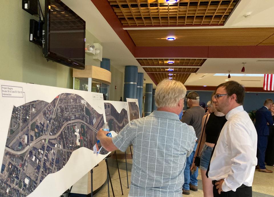 State Department of Transportation officials discuss the State Route 36 Hornell Gateway Corridor project during an open house Tuesday night.