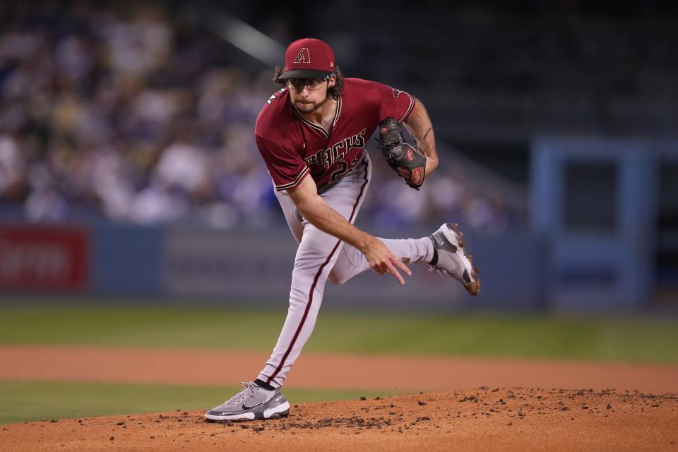 Sep 22, 2022; Los Angeles, California, USA; Arizona Diamondbacks starting pitcher Zac Gallen (23) throws in the first inning against the Los Angeles Dodgers at Dodger Stadium. Mandatory Credit: Kirby Lee-USA TODAY Sports