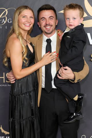 <p>Ethan Miller/Getty</p> From left: Paige, Frankie and Mauz Muniz attend the Steve Irwin Gala on May 11, 2024