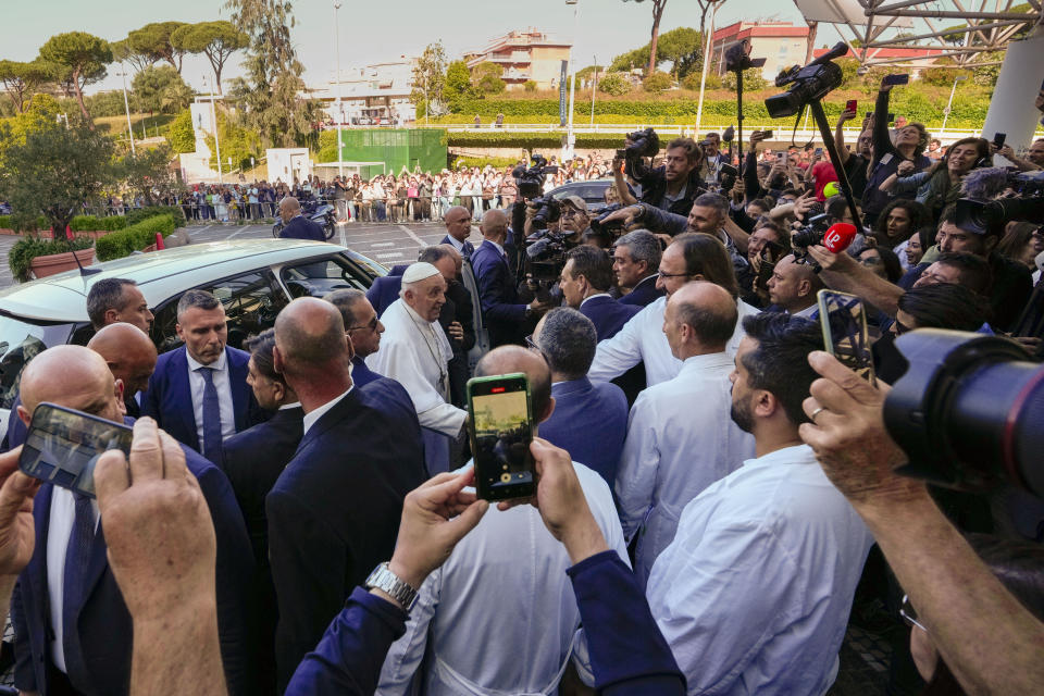 Pope Francis leaves the Agostino Gemelli University Polyclinic in Rome, Friday, June 16, 2023, nine days after undergoing abdominal surgery. The 86-year-old pope was admitted to Gemelli hospital on June 7 for surgery to repair a hernia in his abdominal wall and remove intestinal scar tissue that had caused intestinal blockages. (AP Photo/Alessandra Tarantino)