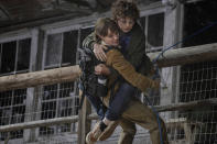 This image released by Warner Bros. Entertainment shows Angelina Jolie and Finn Little in a scene from "Those Who Wish Me Dead." (Emerson Miller/Warner Bros. Entertainment via AP)