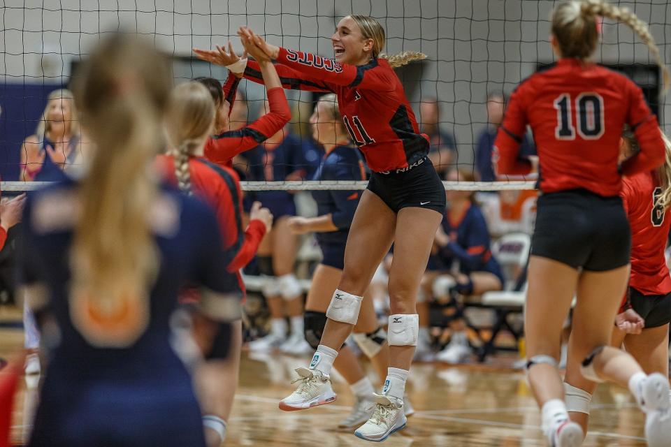 Charlotte Glass (11) celebrates winning a point during Florida High School Athletic Association Class 3A girls' volleyball action at The Benjamin School in in Palm Beach Gardens, Fla., on September 6, 2022. The Scots won the night's match in three straight games over the hosting Buccaneers. 