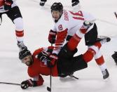 Ice Hockey – Pyeongchang 2018 Winter Olympics – Men Preliminary Round Match - Switzerland v Canada - Kwandong Hockey Centre, Gangneung, South Korea – February 15, 2018 - Marc-Andre Gragnani of Canada (18) in action against Reto Schappi of Switzerland. REUTERS/Grigory Dukor