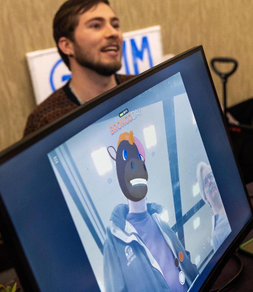 Boise State University student Derek Pyatt, of San Diego, turns passerbys at Hackfort into Buster Bronco with a camera filter he created for the school’s Bronco Day recruiting event last semester.