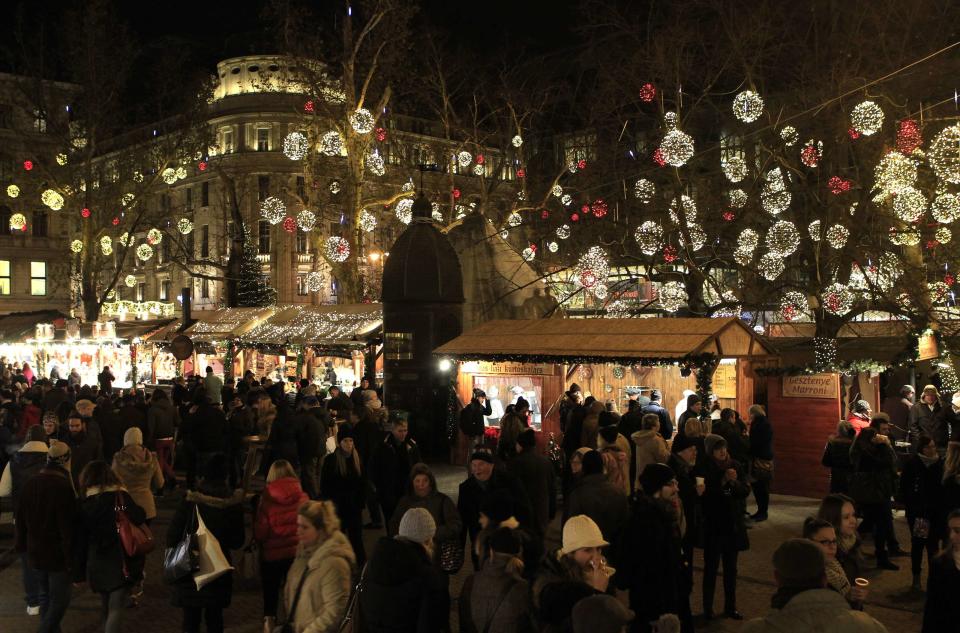 People visit the Budapest Christmas Fair at Vorosmarty square in downtown Budapest