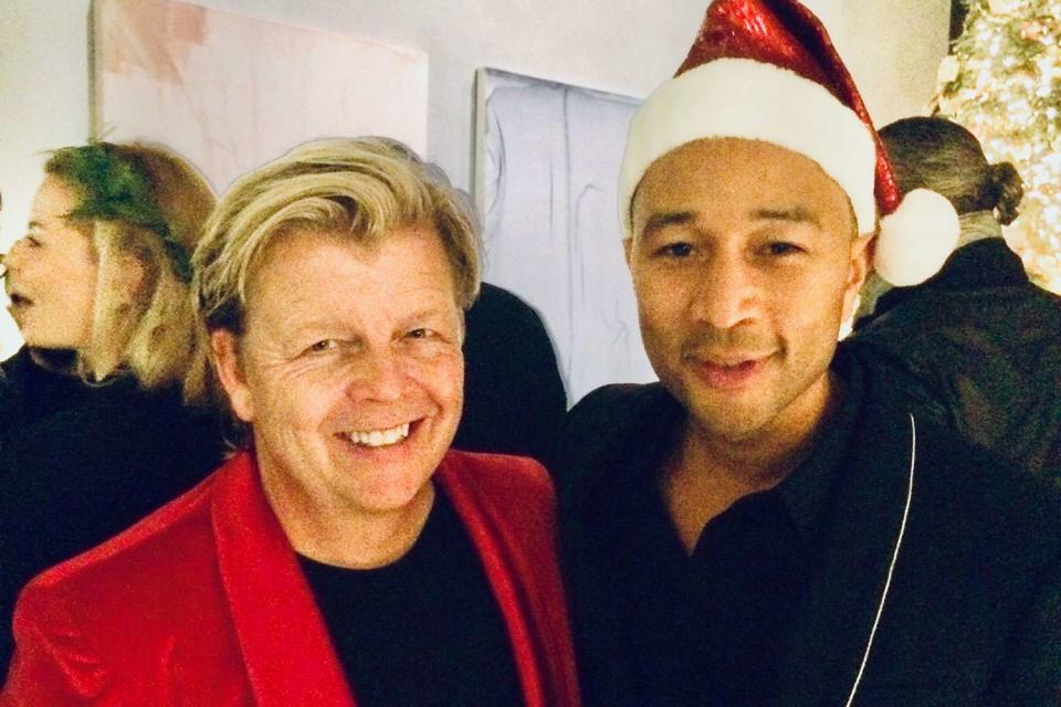 <p>courtesy Dr. Christmas</p> Dr. Christmas — Bob Pranga — with client John Legend in 2019