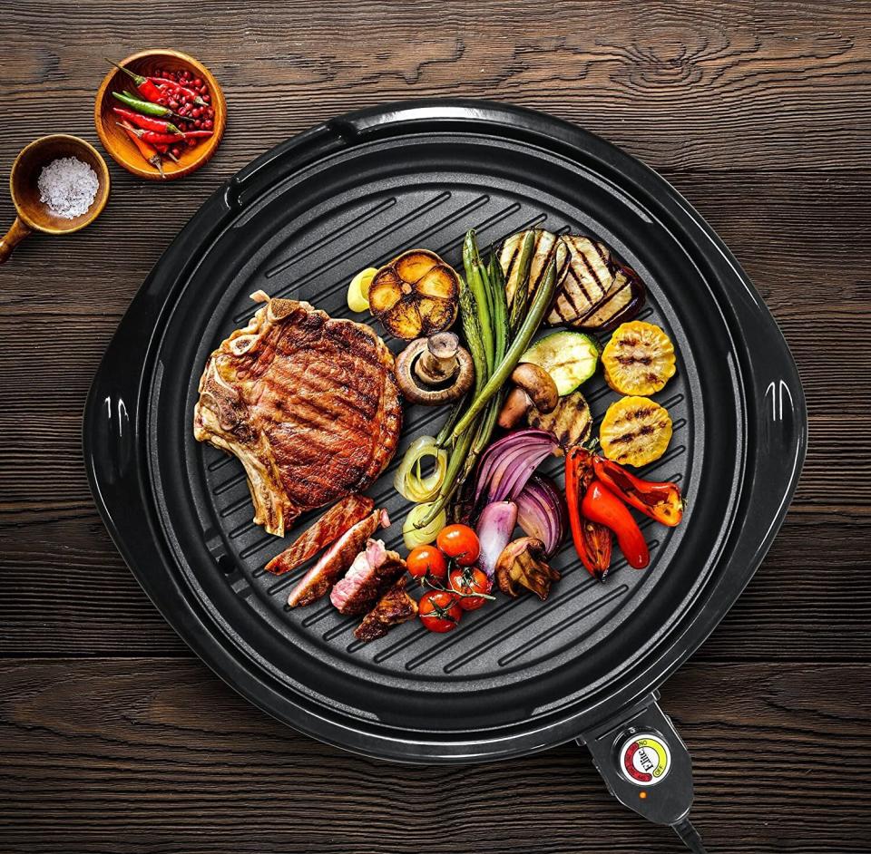 This electric grill features a 14-inch grilling surface, thermostat control and five different heat settings. Plus, all parts on this grill are detachable and safe for the dishwasher. <a href="https://amzn.to/30LEWV2" target="_blank" rel="noopener noreferrer">Find it for $30 at Amazon</a>.