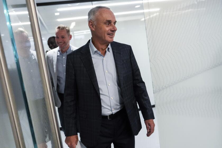 Major League Baseball Commissioner Rob Manfred arrives at a press conference following an owners meeting, Thursday, May 23, 2024, in New York. (AP Photo/Julia Nikhinson)