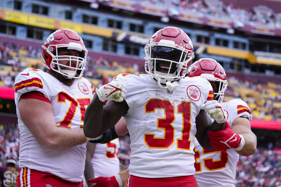 Kansas City Chiefs running back Darrel Williams (31) celebrates his touchdown with teammates during the second half of an NFL football game against the Washington Football Team, Sunday, Oct. 17, 2021, in Landover, Md. (AP Photo/Alex Brandon)