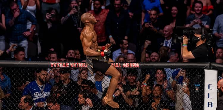 Kamaru Usman celebrates UFC 261 victory