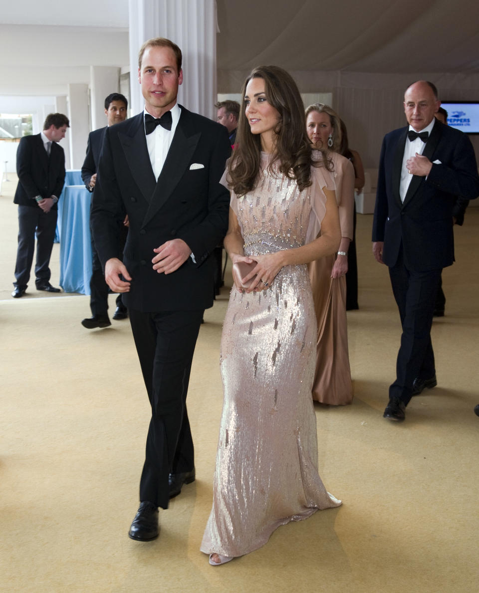 The Duke and Duchess of Cambridge, Prince William and Catherine, attend the 10th Annual Absolute Return for Kids (ARK) Gala Dinner on behalf of the Foundation of Prince William and Prince Harry, at Perks Field, Kensington Palace, in London, on June 9, 2011. AFP PHOTO / POOL / Arthur Edwards (Photo credit should read ARTHUR EDWARDS/AFP via Getty Images)