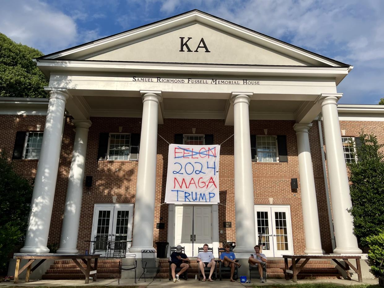 Members of Georgia Tech's Kappa Alpha fraternity sit outside their fraternity house ahead of Thursday night's debate. (Dylan Stableford/Yahoo News)