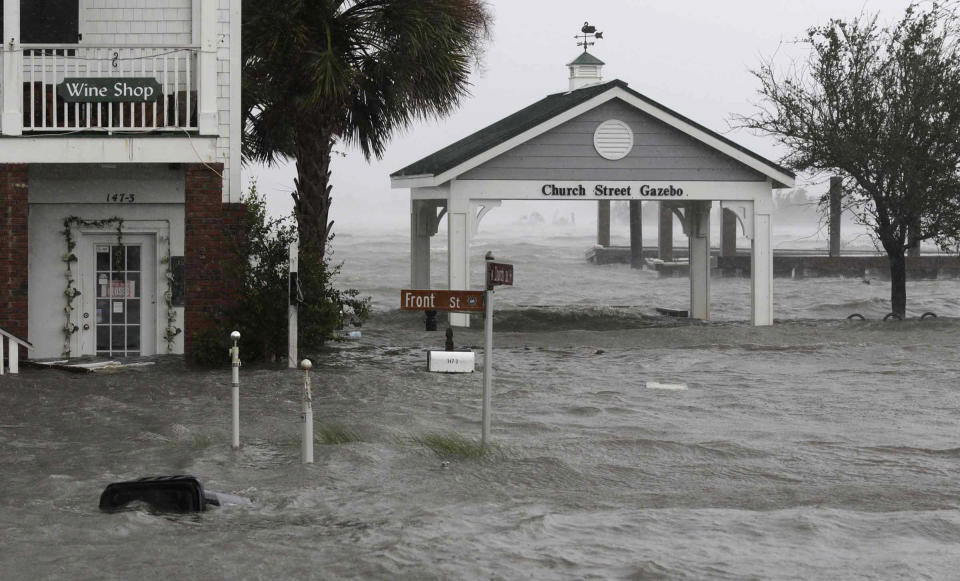 High winds and water surround buildings as Hurricane Florence hits Front Street in downtown Swansboro, North Carolina on Friday.