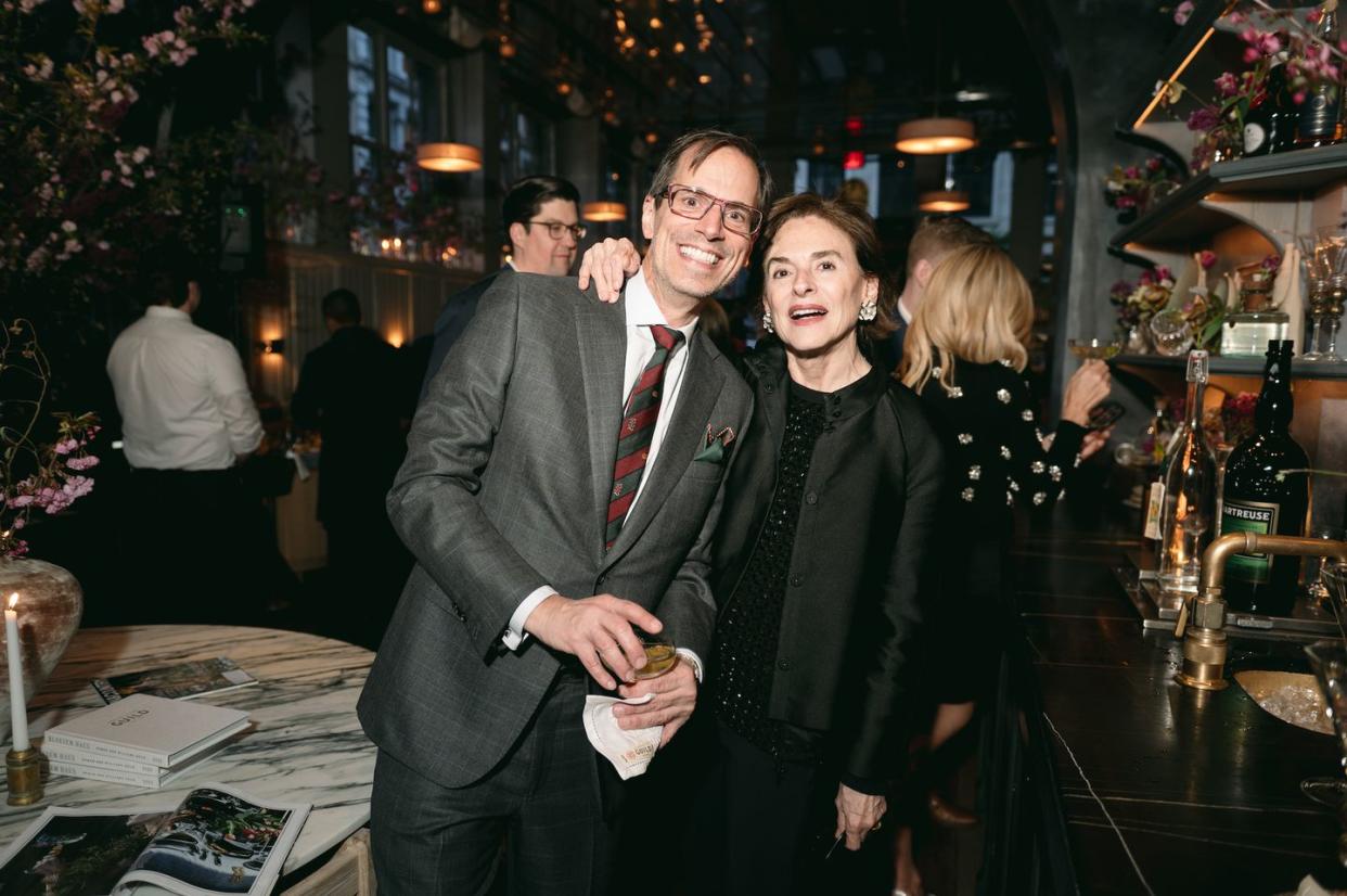 a man and woman posing for a picture