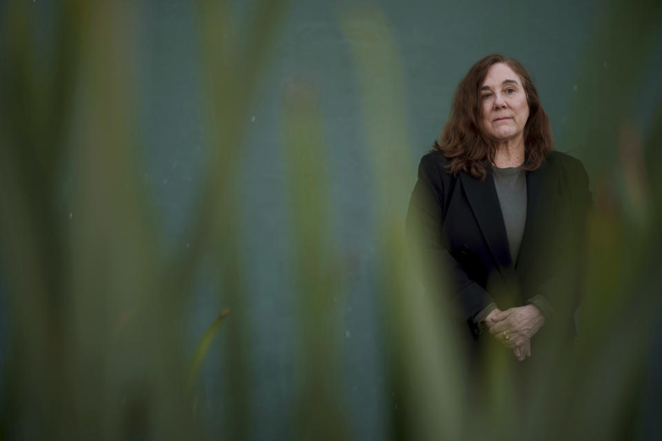 Gabrielle Longhi poses for a portrait, Friday, March 8, 2024, in Los Angeles. In a recent lawsuit, Longhi alleges she was sexually abused at Stone Ridge School of the Sacred Heart in Bethesda, Maryland. The sexual abuse of children by Catholic nuns often has been overlooked in the Catholic clergy abuse crisis, but survivors of nun abuse hope to raise awareness of the issue. (AP Photo/Eric Thayer)