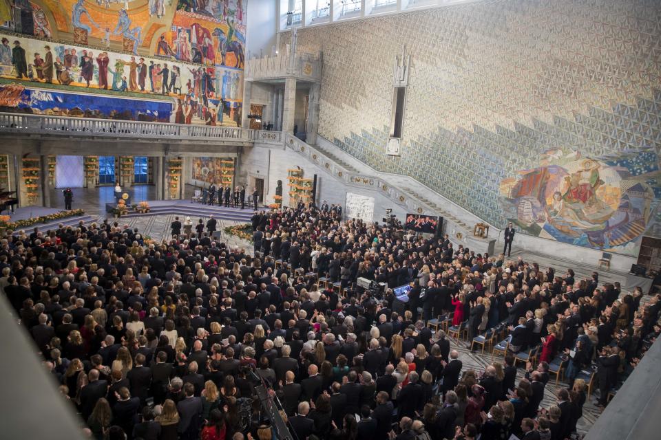 Guests attend the Nobel Peace Prize Ceremony in Oslo Town Hall, Oslo, Monday Dec. 10, 2018. Dr. Denis Mukwege from Congo and Nadia Murad from Iraq will jointly receive the Nobel Peace Prize for their efforts to end the use of sexual violence as a weapon of war and armed conflict. (Berit Roald / NTB scanpix via AP)