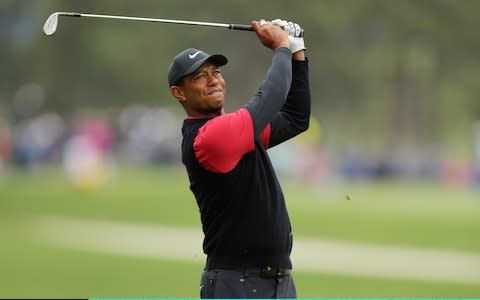 Tiger Woods of the United States plays his second shot on the sixth hole during the final round of The PLAYERS Championship - Credit: Getty Images