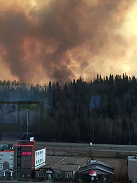 The flight from Fort McMurray began in earnest shortly before midnight Tuesday when the Alberta emergency services placed the city of 100,000 under a mandatory evacuation order