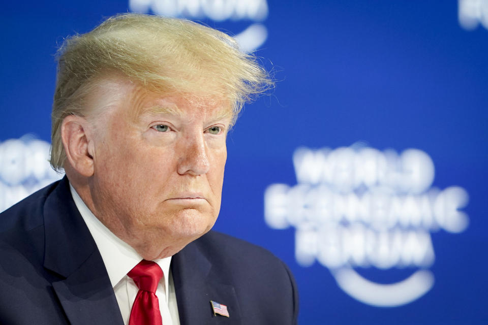 US President Donald Trump waits on stage before addressing a plenary session of the World Economic Forum in Davos, Switzerland, Tuesday, Jan. 21, 2020. The 50th annual meeting of the forum will take place in Davos from Jan. 21 until Jan. 24, 2020. (Gian Ehrenzeller/Keystone via AP)