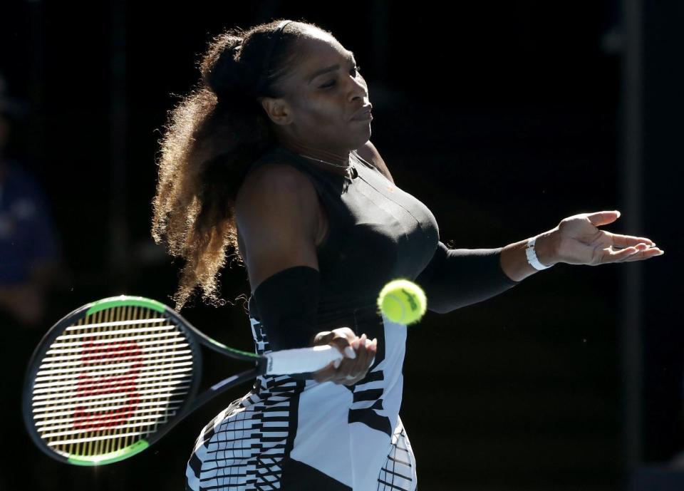 United States' Serena Williams makes a forehand return Croatia's Mirjana Lucic-Baroni during their semifinal at the Australian Open tennis championships in Melbourne, Australia, Thursday, Jan. 26, 2017. (AP Photo/Dita Alangkara)