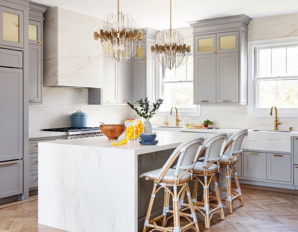 <p>"We're seeing more and more of this beautiful stone and its look-alike around homes, from thicker countertops and wall-mounted vanities, to accent walls, as well as outdoors." — <a href="https://www.instagram.com/thinkchicinteriors/" rel="nofollow noopener" target="_blank" data-ylk="slk:Malka Helft, Think Chic Interiors;elm:context_link;itc:0;sec:content-canvas" class="link "><em><strong>Malka Helft, </strong><strong>Think Chic Interiors </strong></em></a></p>