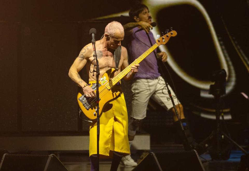 Red Hot Chili Peppers bassist Flea plays am instrumental interlude while lead singer Anthony Kiedis dances at the Toyota Amphitheatre near Wheatland on Sunday, June 2, 2024.