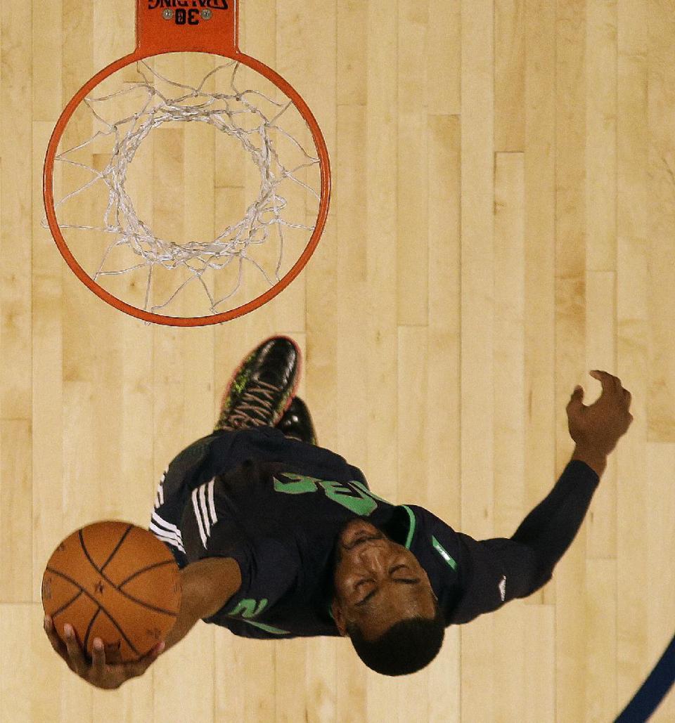 East Team John Wall, of the Washington Wizards (2) heads to the hoop during the NBA All Star basketball game, Sunday, Feb. 16, 2014, in New Orleans. (AP Photo/Gerald Herbert)