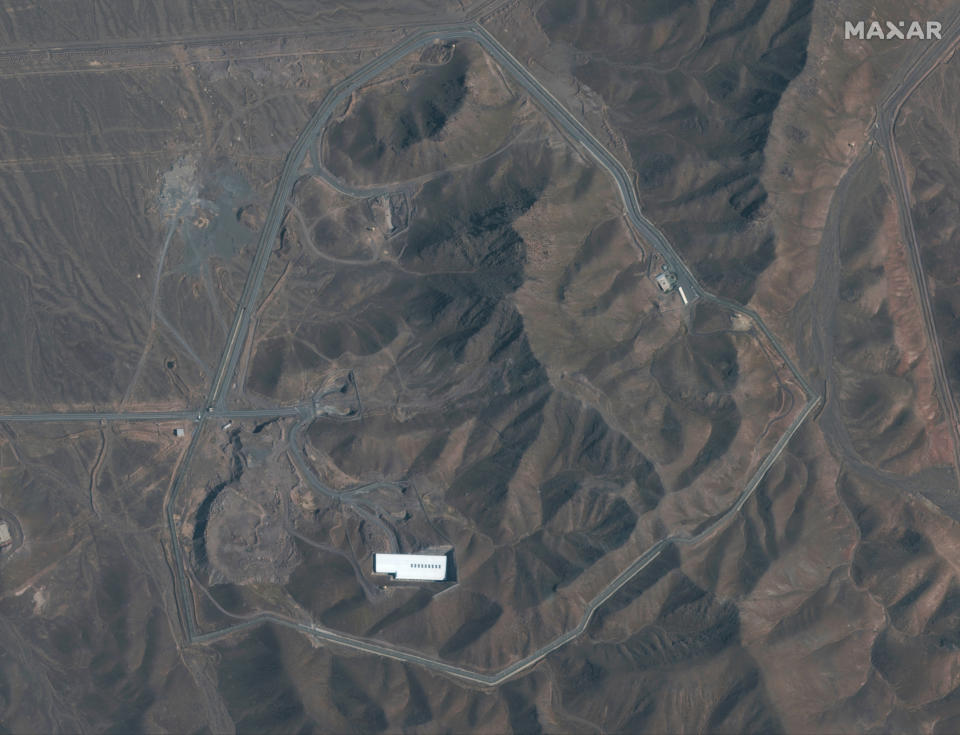 This Nov. 1, 2019, satellite image provided by provided by Maxar Technologies shows the Fordo nuclear facility, just north of the holy city of Qom in Iran. The resumption of activity at Fordo pushes the risk of a wider confrontation involving Iran even higher after months of attacks across the Middle East that the U.S. blames on Tehran. (Satellite image ©2019 Maxar Technologies via AP)