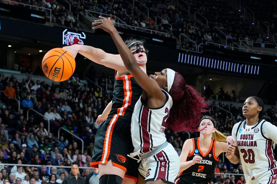 Oregon State Beavers forward Raegan Beers (15) blocks a shot attempt by South Carolina Gamecocks guard Raven Johnson (25) during the second half in the finals of the Albany Regional of the 2024 NCAA Tournament at MVP Arena March 31, 2024, in Albany, New York.