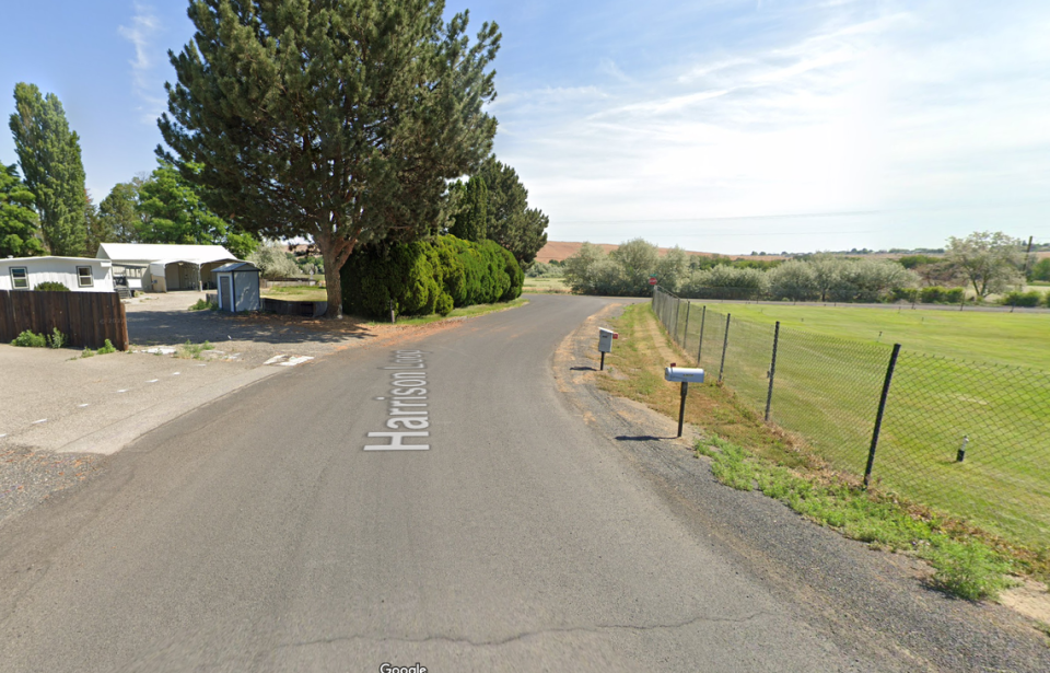 A fire burned through four residential properties on this block of Harrison Loop in Benton City.