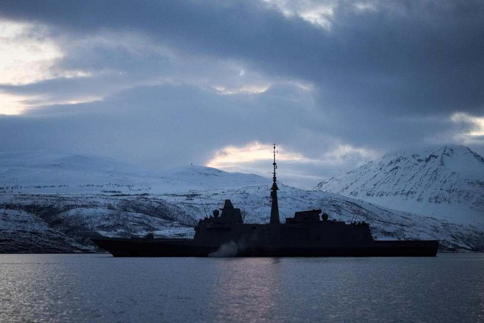 The French navy frigate Normandie patrols in a Norwegian fjord, north of the Arctic circle, Wednesday March 6, 2024. The French frigate is part of a NATO force conducting exercises in the seas, north of Norway, codenamed Steadfast Defender, which are the largest conducted by the 31 nation military alliance since the cold war. (AP Photo/Thibault Camus)